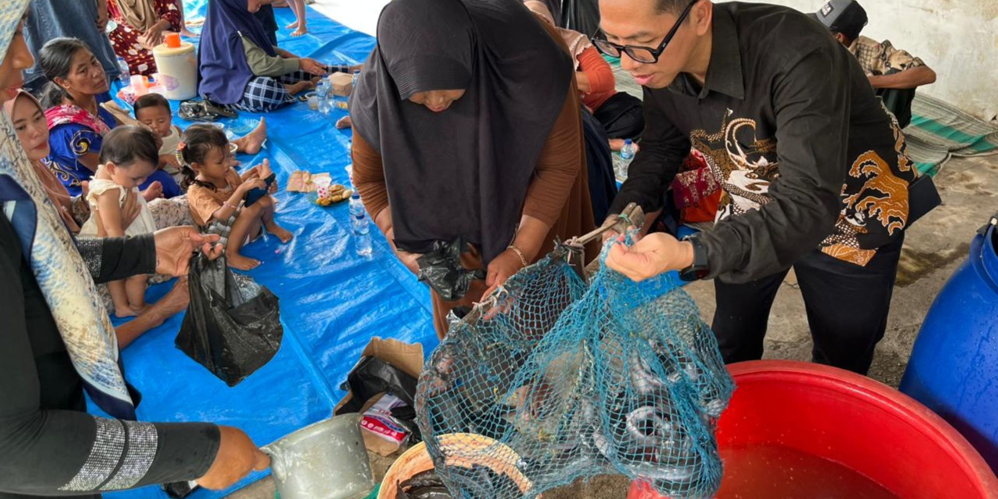 Dosen Undika Terapkan Teknologi Budikdamber Ikan Lele berbasis IoT di Desa Gunungan, Mojokerto